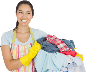 Laughing woman holding laundry basket