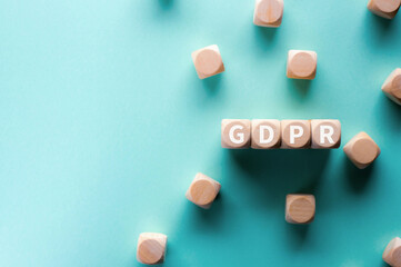 There is wood cubes with the word GDPR. It is an abbreviation for General Data Protection Regulation as eye-catching image.