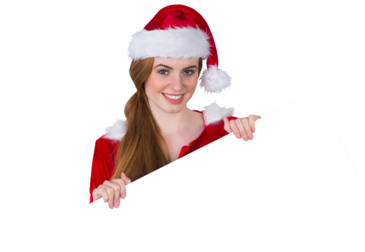 Pretty girl in santa costume showing card