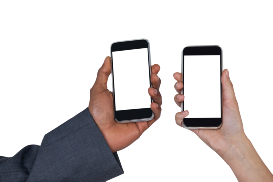 Cropped hands of man and woman holding mobile phones