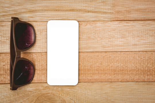 View of glasses and a smartphone