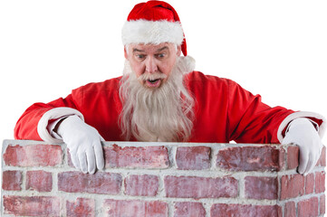 Santa Claus peeking over wall