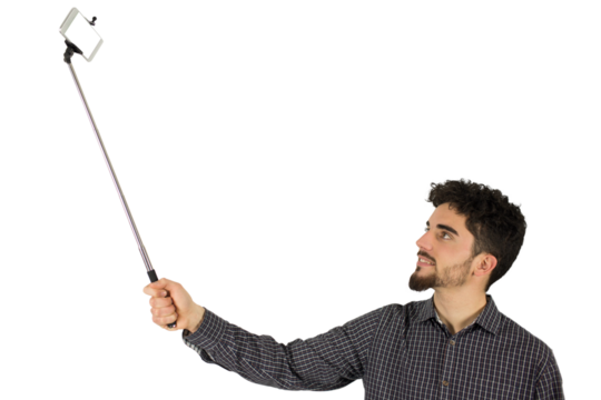 Casual man using a selfie stick - Powered by Adobe