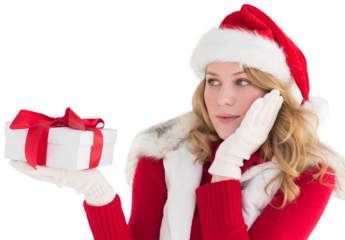 Pretty woman holding gift in a hand