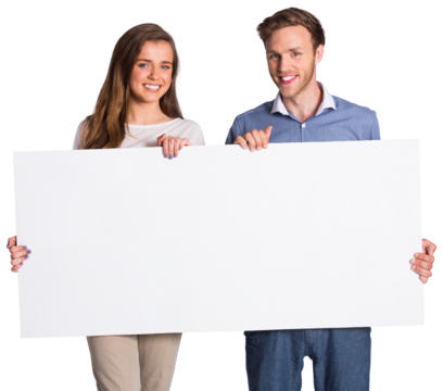 Happy young couple with blank board
