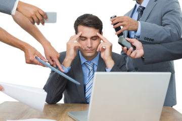 Upset businessman with headache surrounded by team