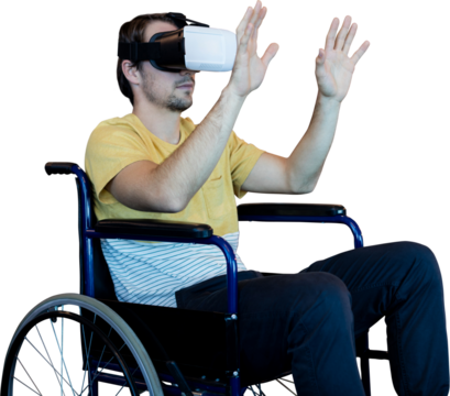 Man using virtual reality glasses while sitting on wheelchair - Powered by Adobe