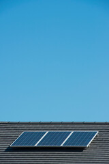 Solar panels on a house roof.