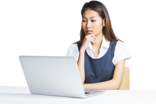 Doubtful businesswoman using a laptop