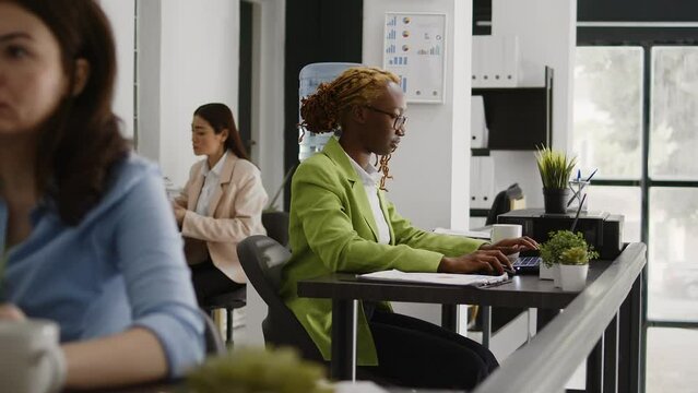 Company employee using data analytics and statistics to inform their business strategy, analyzing annual report to create new agency project. Female worker planning investment for development.