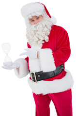 Smiling santa claus holding hourglass