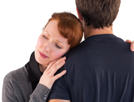 Scared woman holding onto man