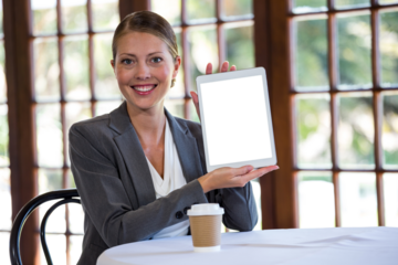 Businesswoman showing digital tablet