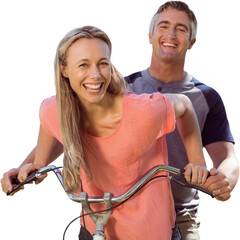 Mature couple cycling while smiling