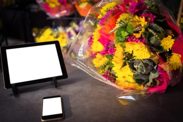 Keuken spatwand met foto Technology with fresh colorful bouquet © vectorfusionart