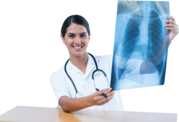 Female doctor examining chest X-ray