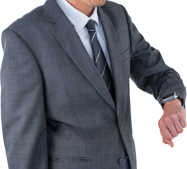 Mid section of businessman checking smart watch