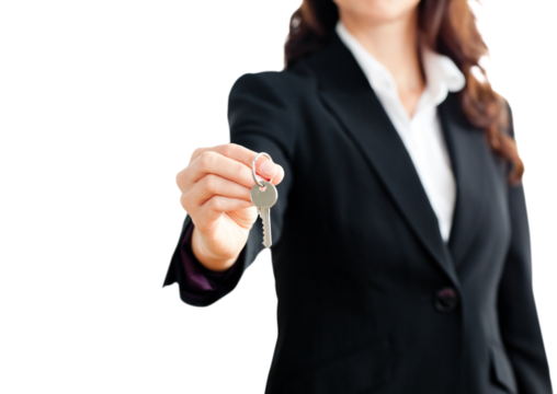 Close up of a confident businesswoman holding a key