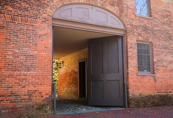 pretty metal gate or fence entrance can symbolize elegance, sophistication, and beauty. It can also represent the merging of function and aesthetics.
