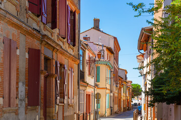 Fototapeta na wymiar View of streets and houses of Muret commune in Haute-Garonne department, southwestern France