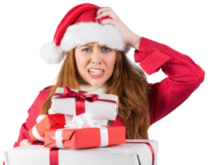 Festive stressed redhead holding gifts