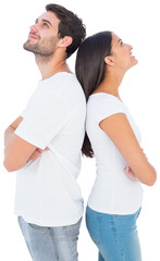 Happy couple standing looking up