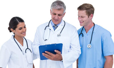 Doctor working with colleagues while holding writing pad 