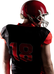 American football player standing in rugby helmet