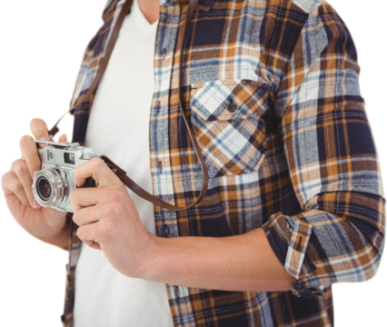 Mid section of hipster holding camera