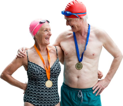 Senior couple in swimwear wearing medals