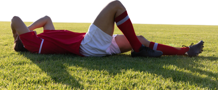 Male rugby player laying - Powered by Adobe