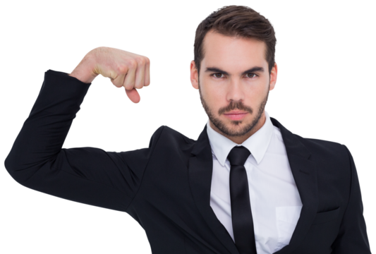 Businessman tensing arm muscle and looking at camera - Powered by Adobe
