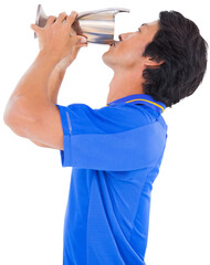 Football player kissing trophy while holding it 