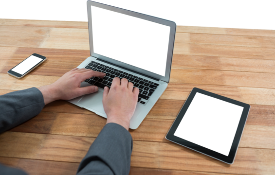 Businessman using laptop at table