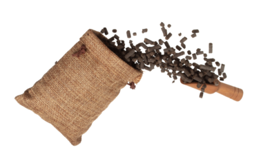 Fertilizer Organic natural fly fall in sack bag, tube compost fertilizer for planting float in air. Organic fertilizer throw in mid air. White background isolated high speed freeze motion