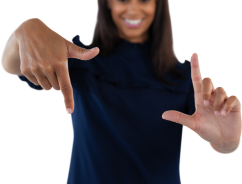 Female executive forming a finger frame - Powered by Adobe