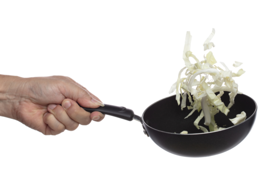 Cabbage fly in pan, green fresh vegetable cabbage cut chop slice food. Organic fresh vegetable with eaten leaf of cabbage falling, close up texture. White background isolated freeze motion high speed