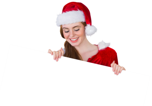 Pretty girl in santa costume showing card