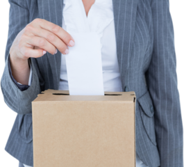 Businesswoman putting ballot in vote box