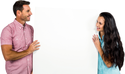 Young couple holding white sheet