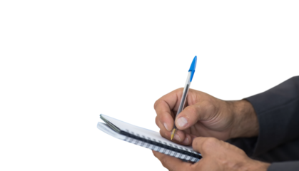 Close up of man writing in spiral book