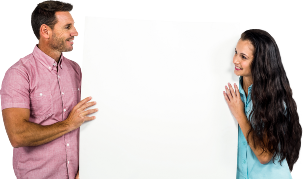 Young couple holding white sheet