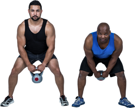 Strong friends lifting kettlebells together