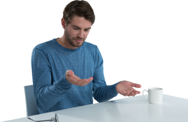 Man pretending to hold an invisible object