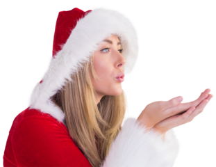 Pretty santa girl blowing over hands