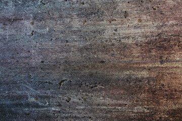 Concrete stone textured wall. Color changes from blue to reddish brown. Textured background with...