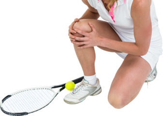 Injured athlete with tennis racket and tennis ball