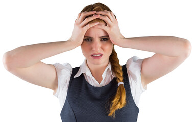 Stressed businesswoman with hands on head