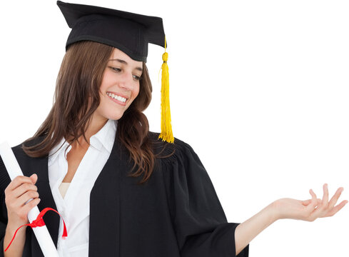 A smiling woman with a degree as she opens out her other hand