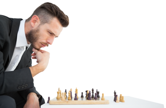 Hipster businessman playing game of chess 